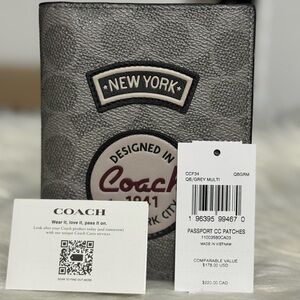 Passport Card Case
In Signature Canvas With Patches